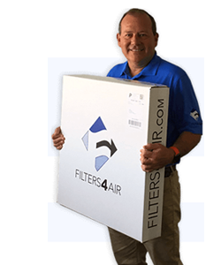David Dilling holding a box of filters